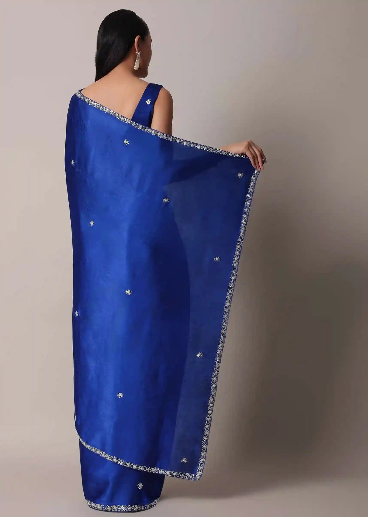 Royal Sapphire Satin Saree with Stone Embellished Border – Luxury Trade Trend Edition