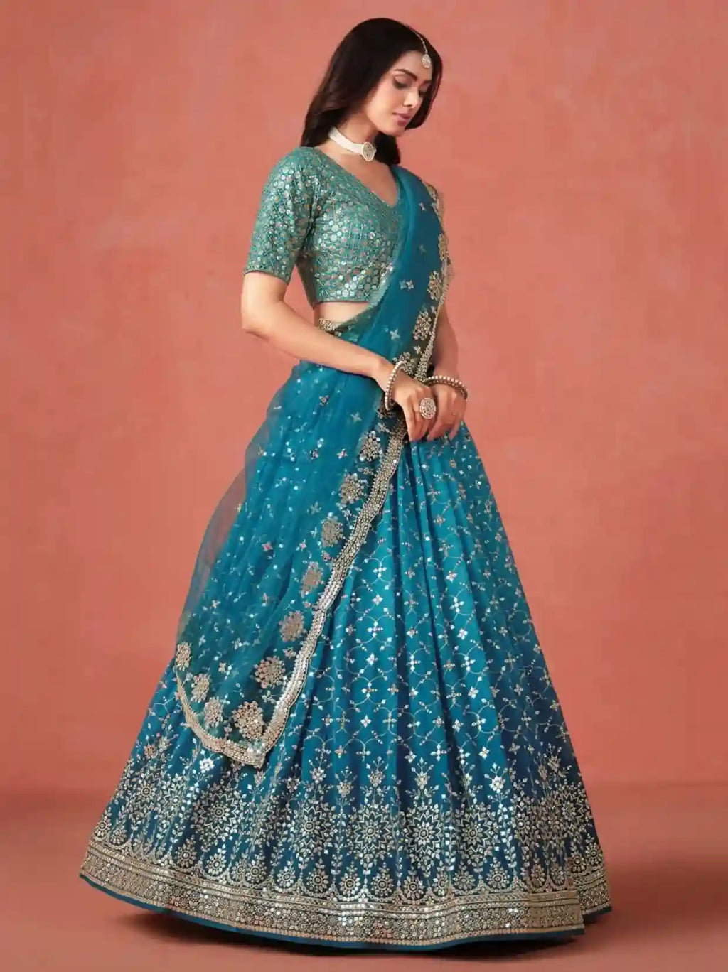 Teal Blue Embroidered Lehenga Choli – A Masterpiece of Elegance and Tradition