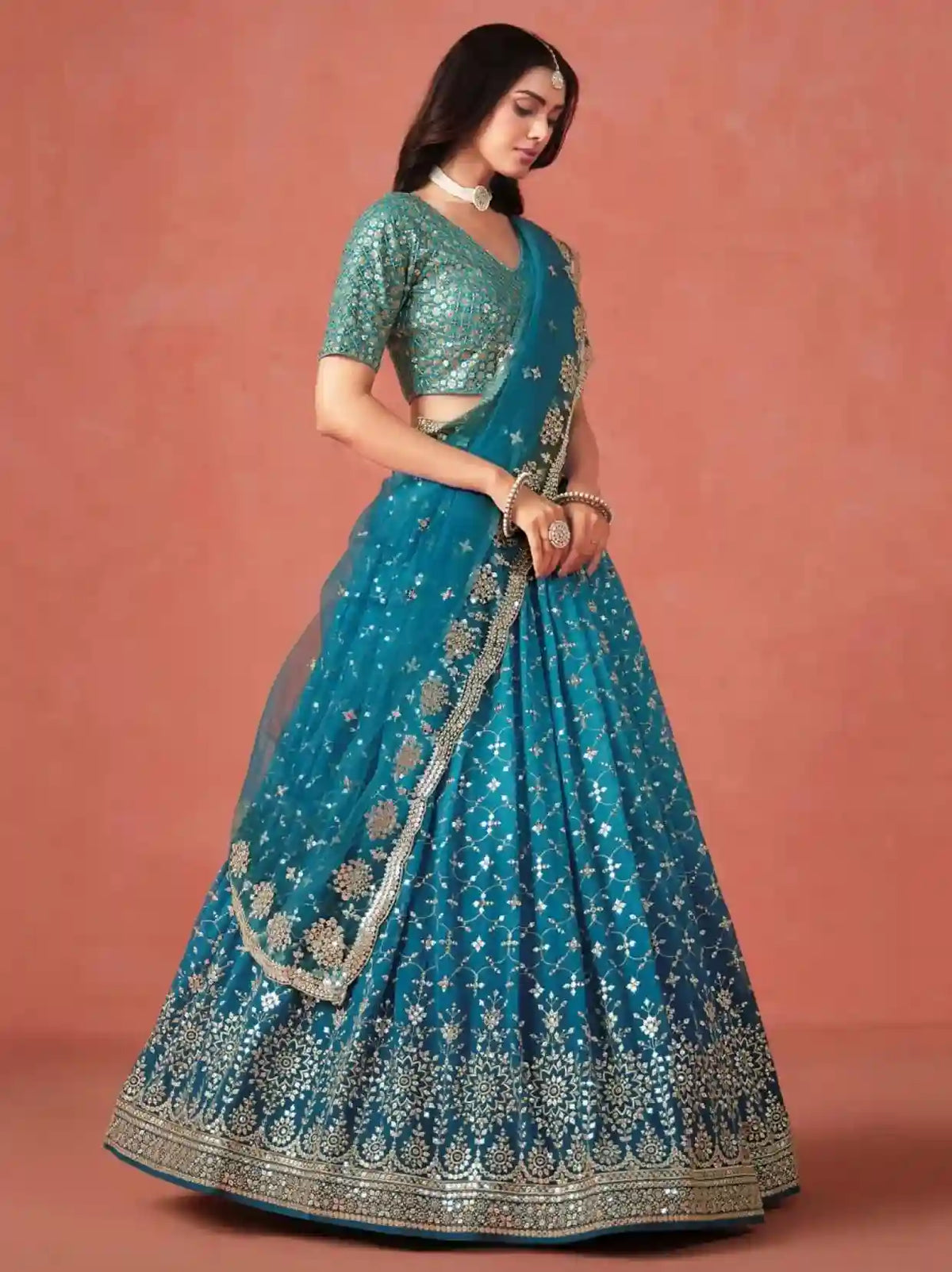 Teal Blue Embroidered Lehenga Choli – A Masterpiece of Elegance and Tradition